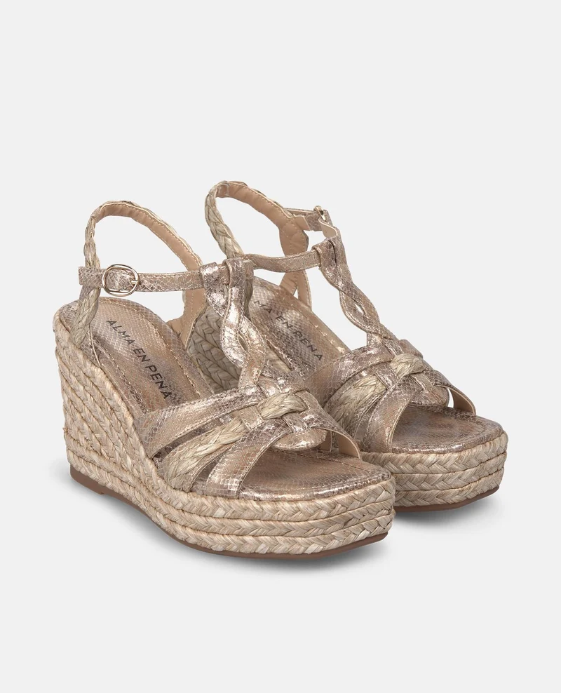 SANDALIA CUÑA CON TIRAS ENTRELAZADAS