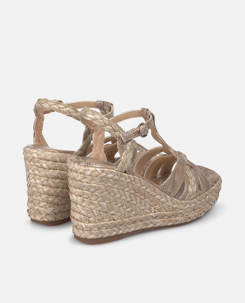 SANDALIA CUÑA CON TIRAS ENTRELAZADAS