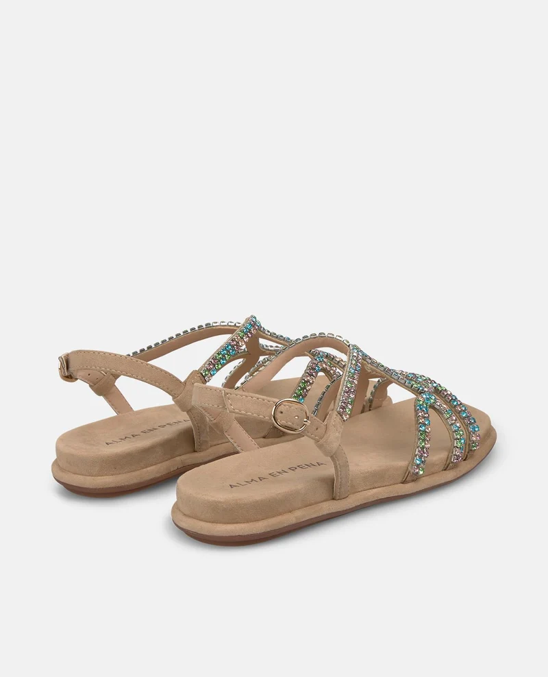 SANDALIA PLANA ENTRELAZADA TACHUELAS